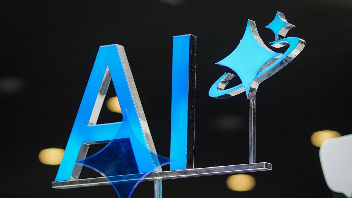 An AI sign is displayed during the Mobile World Congress  (MWC), the world&#039;s biggest mobile fair, in Barcelona, Spain, March 3, 2025. (AFP photo)