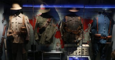 Turkish and ANZAC military uniforms from the Gallipoli campaign are displayed at the mobile museum in Skanderbeg Square, Tirana, Albania, March 24, 2025. (AA Photo)