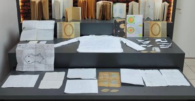 Notebooks, papers and books believed to be used for witchcraft are seized during searches of the suspects' homes, Batman, southeastern Türkiye, March 21, 2025. (AA Photo)