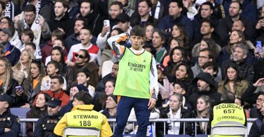 Real Madrid&#039;s Arda Güler watches from the sidelines during the La Liga match against Rayo Vallecano at the Santiago Bernabeu, Madrid, Spain, March 9, 2025. (AA Photo)