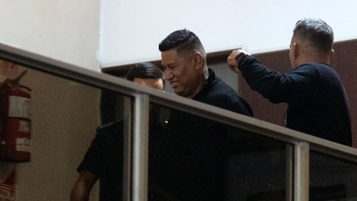 Late Argentine football legend Diego Maradona&#039;s former security Julio Coria (C) is escorted after being detained for false testimony at the San Isidro court, San Isidro, Buenos Aires, Argentina, March 25, 2025. (AFP Photo)