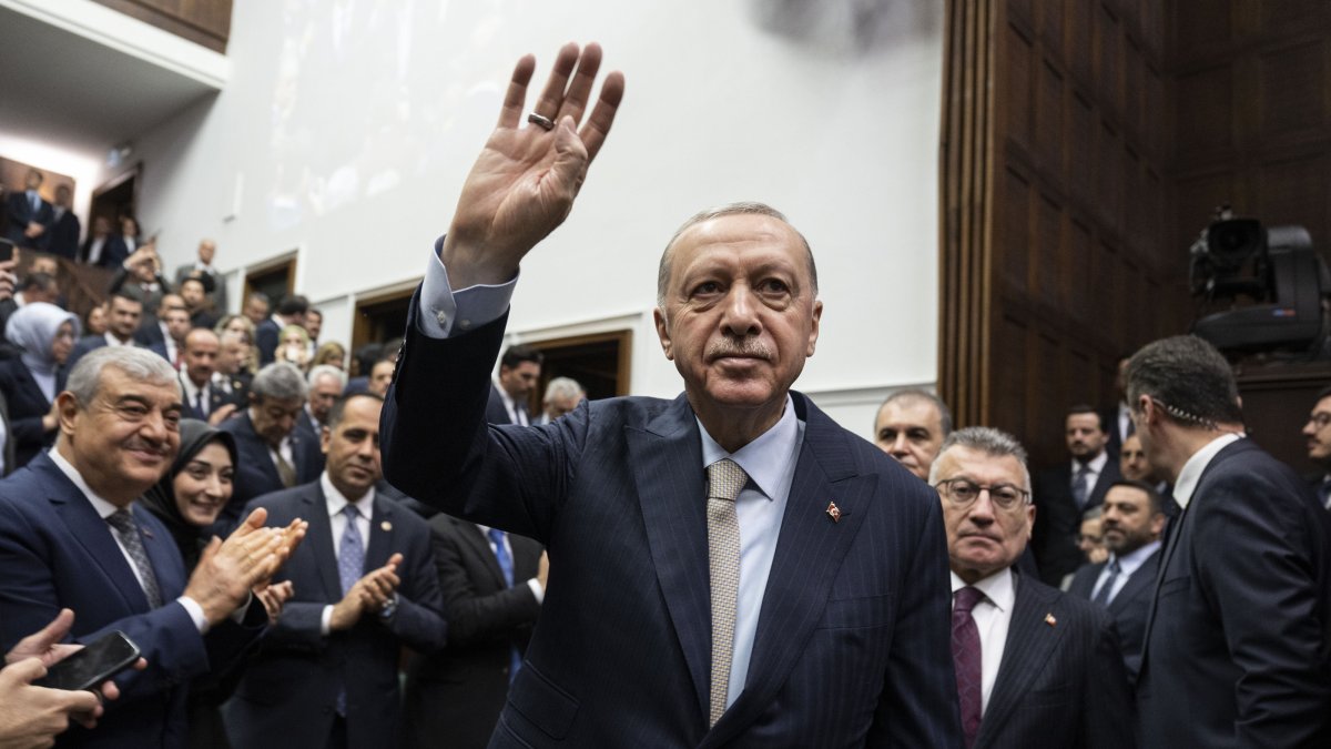 President Recep Tayyip Erdoğan greets supporters as he arrives for the Justice and Development Party (AK Party) parliamentary group meeting, Ankara, Türkiye, March 26, 2025. (AA Photo)