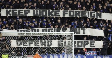 Rangers fans hold up a sign in the stands during their Europa League match against Fenerbahçe, at Ibrox Stadium, Glasgow, Scotland, March 13, 2025. (AP Photo)