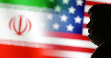 A 3D-printed miniature model of U.S. President Donald Trump and the U.S. and Iranian flags are seen in this illustration taken on Jan. 15, 2025. (Reuters Photo)