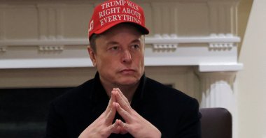 Tesla CEO Elon Musk wears a &quot;Trump Was Right About Everything!&quot; hat while attending a Cabinet meeting at the White House, Washington, U.S., March 24, 2025. (Reuters Photo)