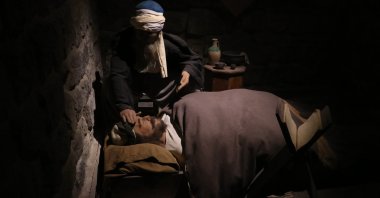 An exhibit of a healer treating a patient at the Gevher Nesibe Medical Complex, Kayseri, Türkiye, March 24, 2025. (AA Photo)
