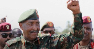 Sudan&#039;s army chief Abdel-Fattah Burhan gestures to soldiers inside the presidential palace, in the capital Khartoum, Sudan, March 26, 2025. (Reuters Photo)