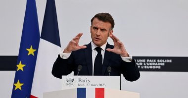 France's President Emmanuel Macron speaks during a press conference following a summit for "coalition of the willing" at the Elysee Palace, in Paris, on March 27, 2025. LUDOVIC MARIN/Pool via REUTERS