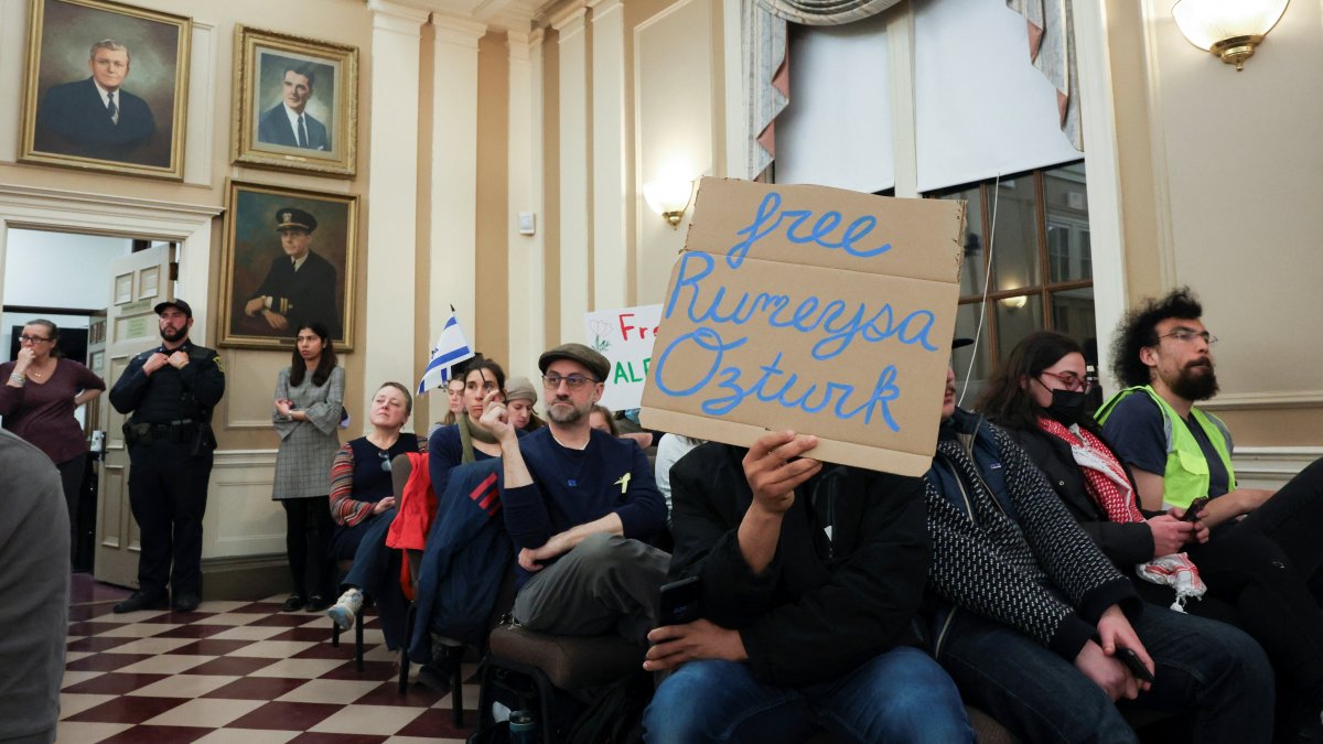 Demonstrators attend a city council meeting after Tufts Ph.D. student Rumeysa Ozturk was taken into custody by federal agents, Somerville, Massachusetts, U.S., March 27, 2025.  (REUTERS Photo)