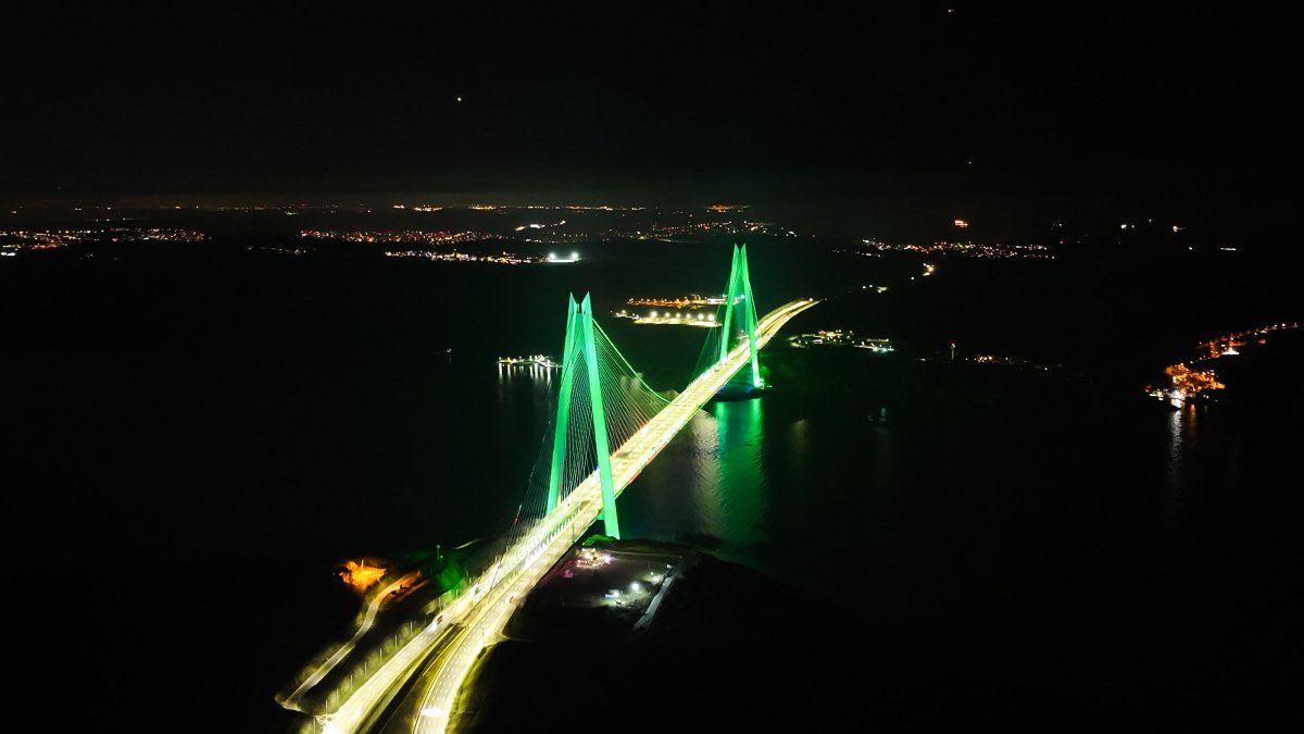 The Yavuz Sultan Selim Bridge is seen illuminated with green lights to raise awareness about the fight against addictions as part of Green Crescent Week, Istanbul, Türkiye, March 5, 2025. (AA Photo)