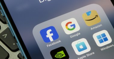 App icons of big tech companies including Meta Platforms, Alphabet Inc., Amazon.com, Nvidia, Apple Inc. and Microsoft Corporation, are seen on a smartphone, Portland, U.S., Oct. 19, 2024. (Shutterstock Photo)