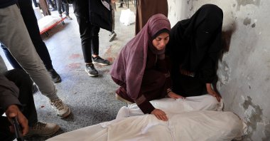 Mourners react next to the bodies of Palestinians killed in Israeli strikes, at Al-Ahli Arab Baptist Hospital, Gaza City, Palestine, March 26, 2025. (Reuters Photo)