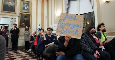 Demonstrators attend a city council meeting after Tufts Ph.D. student Rumeysa Ozturk was taken into custody by federal agents, Somerville, Massachusetts, U.S., March 27, 2025.  (REUTERS Photo)