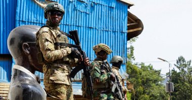 Members of the M23 rebel group stand guard as people attend a rally addressed by Corneille Nangaa, Congolese rebel leader and coordinator of the AFC-M23 movement, Bukavu, Democratic Republic of Congo, Feb. 27, 2025. (Reuters Photo)