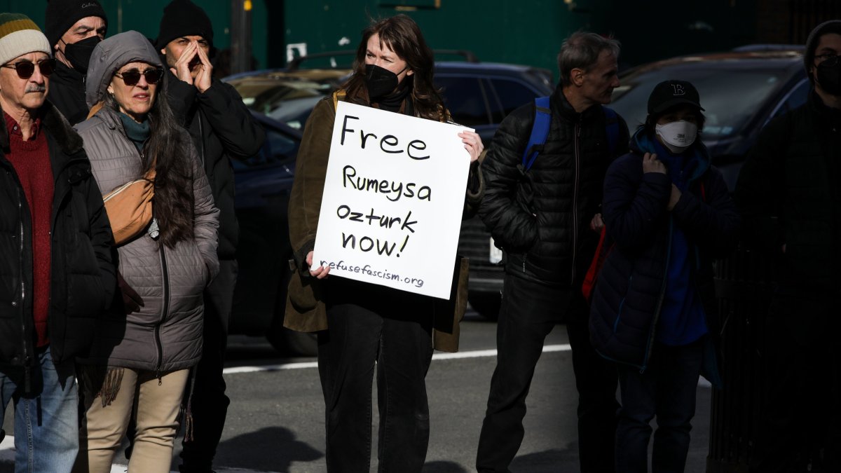 A resident holds a sign supporting Rümeysa Özturk during a protest at Harvard Square, Cambridge, Massachusetts, U.S., March 27, 2025. (EPA Photo)