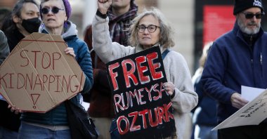 Protesters hold signs supporting Rumeysa Öztürk during a protest at Harvard Square in Cambridge, Massachusetts, U.S., March 27, 2025. (EPA Photo)