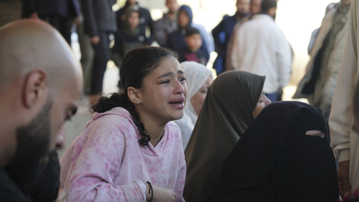 Relatives react next to the body of a Palestinian who was killed in the Israeli bombardment of the Gaza Strip at Al-Aqsa Hospital, Deir al-Balah, Gaza Strip, Palestine, March 30, 2025. (AP Photo)