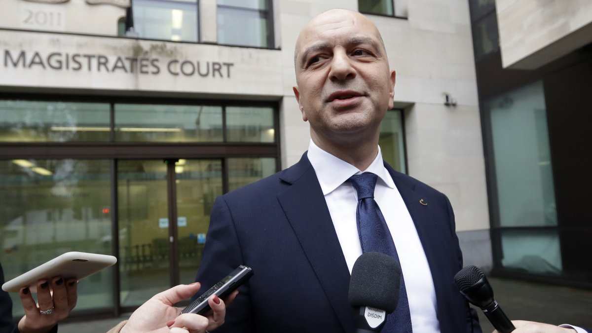 Akin Ipek speaks to media as he leaves Westminster Magistrates Court after his extradition hearing was dismissed, London, U.S., Nov. 28, 2018. (AP Photo)