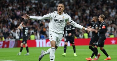 Real Madrid&#039;s Kylian Mbappe celebrates after converting a penalty to score their first goal during the Spanish league football match  Leganes at the Bernabeu stadium, Madrid, Spain, March 29, 2025. (AFP Photo)