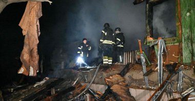 Rescuers inspect the rubble of the building following a drone attack amid the Russian invasion of Ukraine, Kharkiv, Ukraine, March 29, 2025. (AFP Photo)
