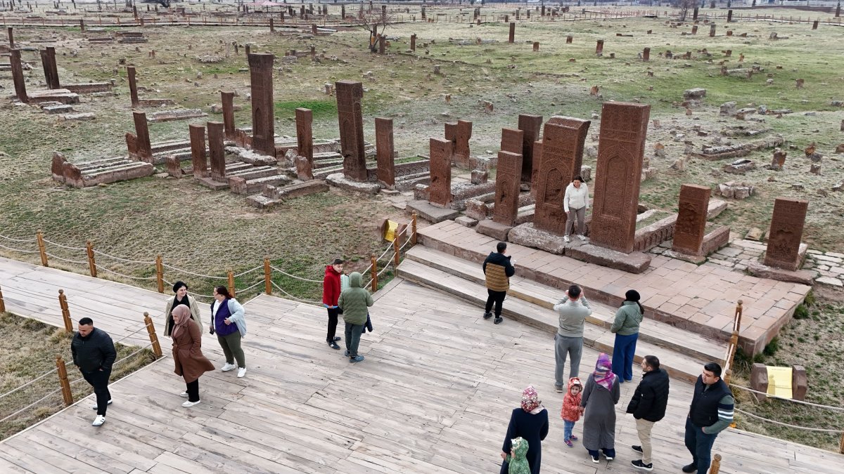 Visitors explore the Seljuk Meydan Cemetery in Ahlat during Ramadan Bayram, Türkiye, March 31, 2025. (IHA Photo) 
