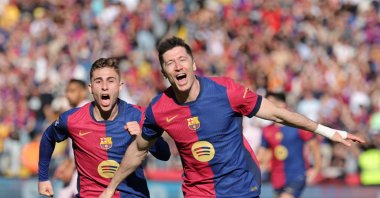 Barcelona&#039;s Robert Lewandowski (R) celebrates scoring his team&#039;s second goal during the La Liga match against Girona at the Estadi Olimpic Lluis Companys, Barcelona, Spain, March 30, 2025. (AFP Photo)
