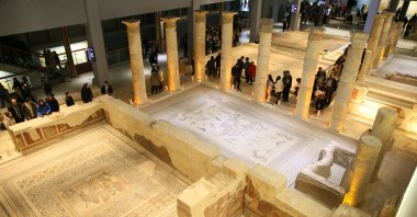 Visitors explore the Zeugma Mosaic Museum on the first day of Eid al-Fitr, Gaziantep, southeastern Türkiye, March 30, 2025. (AA Photo)