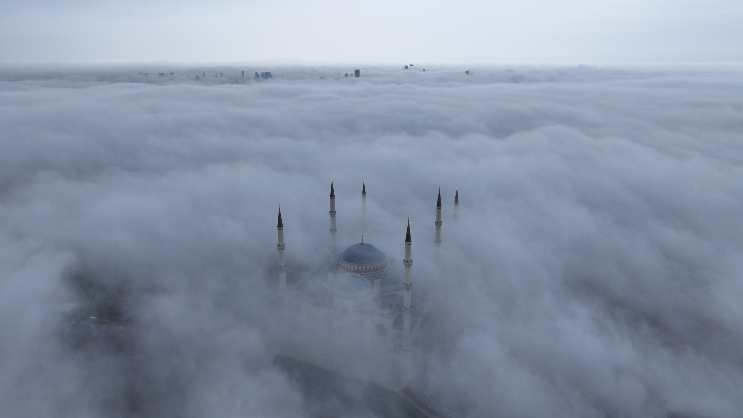 An aerial view of Istanbul shrouded in early morning fog, Türkiye, April 1, 2025. (AA Photo)