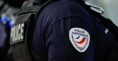A police officer waits outside the courtroom on the day of the verdict of the trial of French far-right leader Marine Le Pen, at the courthouse in Paris, March 31, 2025. (Reuters Photo)