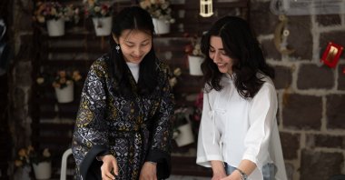 Students practice the traditional art of ebru, creating colorful patterns on water, Ankara, Türkiye, March 28, 2025. (AA Photo)