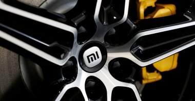The logo of Xiaomi is seen on a tire wheel of Xiaomi's first electric vehicle SU7, Beijing, China March 25, 2024. (Reuters Photo)