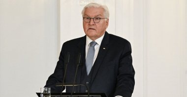 German President Frank-Walter Steinmeier speaks during a ceremony to hand over the certificate of discharge to the outgoing German Chancellor and his government at the Bellevue presidential palace in Berlin, March 25, 2025. (AFP Photo)