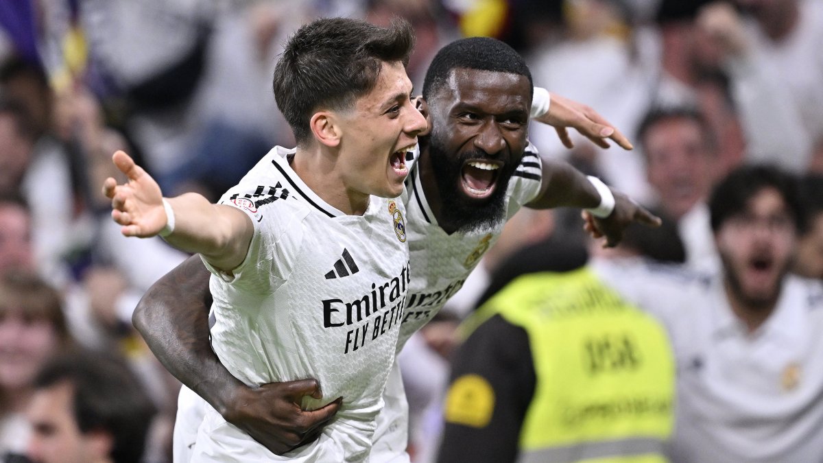 Real Madrid Antonio Rudiger (R) celebrates with Arda Güler after scoring the fourth goal against Real Sociedad during the Copa del Rey semifinal second leg match against Real Sociedad, Madrid, Spain, April 1, 2025. (AA Photo)