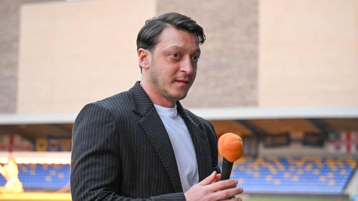 Former football player Mesut Özil, a member of the AK Party Central Decision and Executive Board (MKYK) speaks at a mass iftar program, London, U.K., March 16, 2025. (AA Photo)