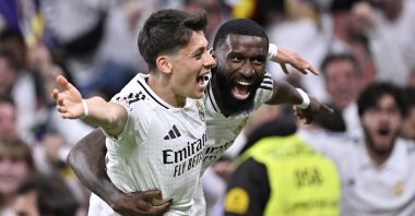 Real Madrid Antonio Rudiger (R) celebrates with Arda Güler after scoring the fourth goal against Real Sociedad during the Copa del Rey semifinal second leg match against Real Sociedad, Madrid, Spain, April 1, 2025. (AA Photo)