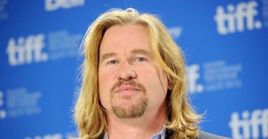 Actor Val Kilmer speaks onstage at the &quot;Twixt&quot; press conference during the 2011 Toronto International Film Festival, Toronto, Canada, Sept. 12, 2011. (AFP Photo)