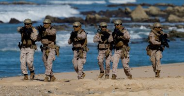 Spanish soldiers take part in the Exercise Dynamic Mariner 25 military drill training, involving NATO naval forces, Barbate, Spain, March 28, 2025. (Reuters Photo)