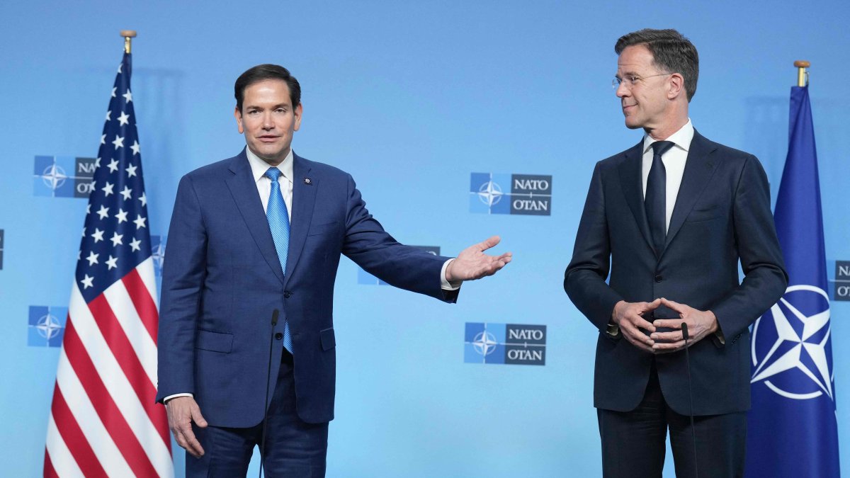 NATO Secretary-General Mark Rutte (R) and U.S. Secretary of State Marco Rubio hold a joint statement during a meeting of NATO Ministers of Foreign Affairs at NATO's headquarters in Brussels, Belgium, April 3, 2025. (AFP Photo)