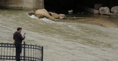 The flow of Çoruh River, as its water level rises due to snowmelt and heavy rainfall, passes through Bayburt, Türkiye, April 3, 2025. (IHA Photo)