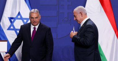 Hungarian Prime Minister Viktor Orban and Israeli Prime Minister Benjamin Netanyahu walk after speaking to the media in Budapest, Hungary, April 3, 2025. (Reuters Photo)