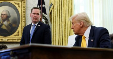 U.S. National Security Advisor Michael Waltz looks on next to U.S. President Donald Trump in the Oval Office of the White House in Washington, D.C., U.S., March 7, 2025. (Reuters Photo)