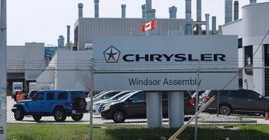 A Canadian flag flies outside the Stellantis Windsor Assembly Plant in Windsor, Ontario, Canada, April 3, 2025. (AFP Photo)