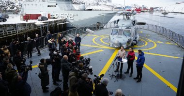 Denmark&#039;s Prime Minister Mette Frederiksen (Left), Greenland&#039;s acting head of government Mute Bourup Egede (Right), and newly elected head of government Jens-Frederik Nielsen (Center), during a news conference aboard the Danish Navy inspection ship Vaedderen in Nuuk, Greenland, April 3, 2025. (EPA Photo)