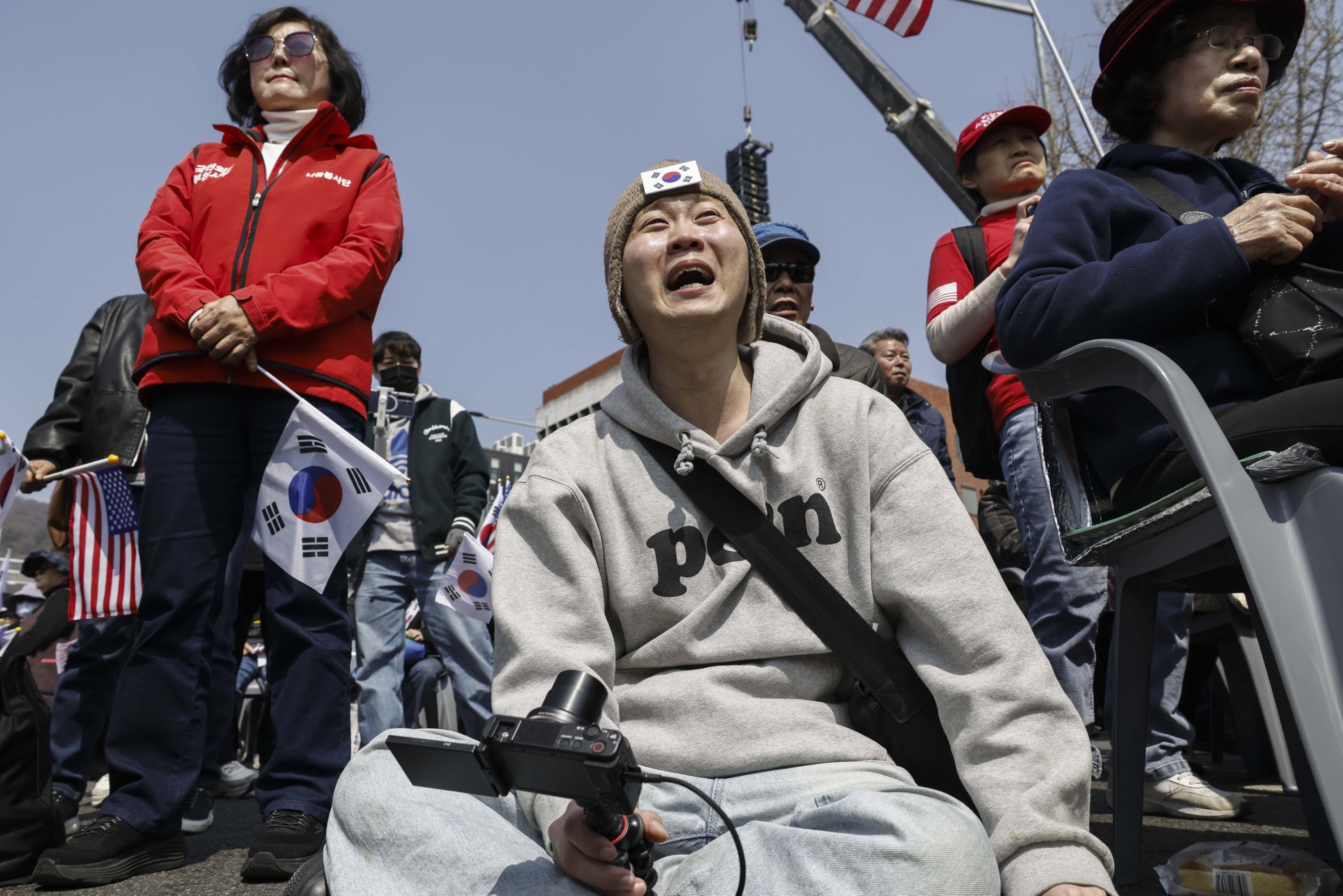 Supporters of impeached South Korean President Yoon Suk Yeol react following a constitutional court ruling on his impeachment case, Seoul, South Korea, April 4, 2025. (EPA Photo)