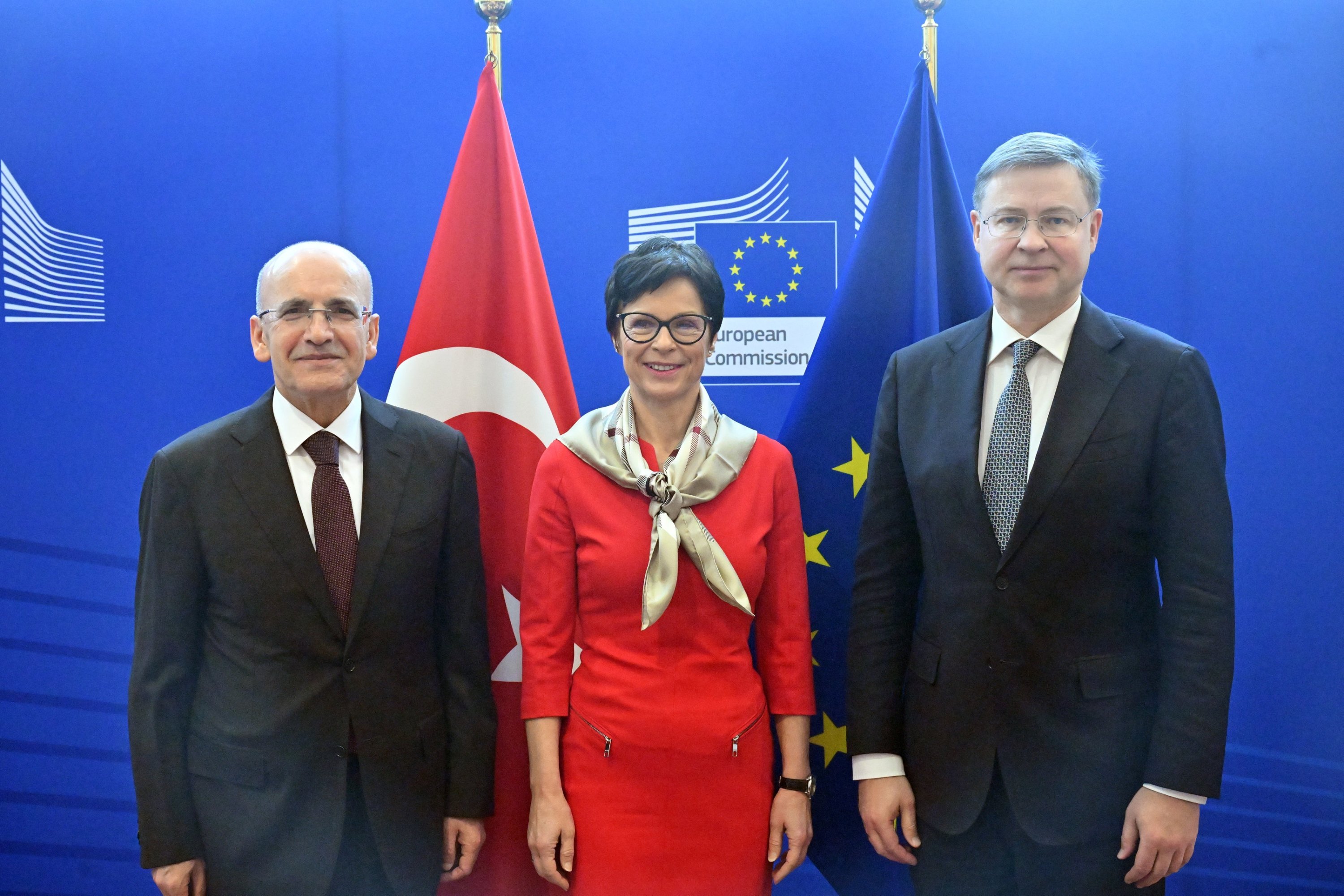 From left, Treasury and Finance Minister Mehmet Şimşek, EU Commissioner for Economy and Productivity Valdis Dombrovskis and EU Commissioner for Enlargement Marta Kos, Brussels, Belgium, April 3, 2025. (AA Photo)