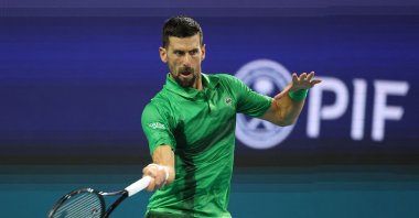 Serbia&#039;s Novak Djokovic returns a shot against Czechia&#039;s Jakub Mensik during the men&#039;s singles final on the final day of the Miami Open, Miami, Florida, U.S., March 30, 2025. (AFP Photo)