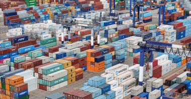 Shipping containers are stacked at a port in Yantai, in eastern China&#039;s Shandong province, April 3, 2025. (AFP Photo)