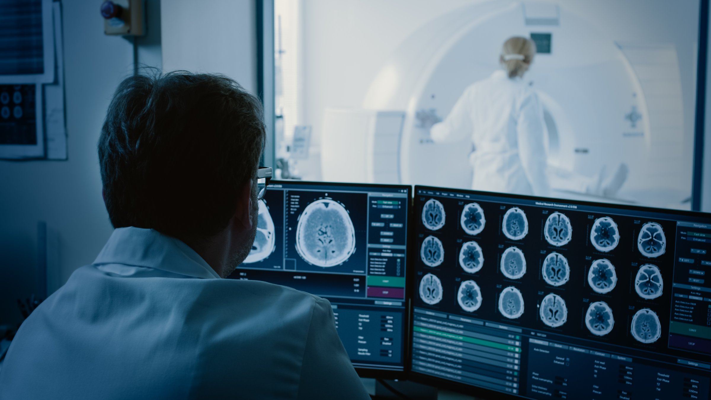 A doctor examines a patient&#039;s MRI scan at a health center. (Shutterstock Photo)