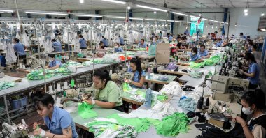 Vietnamese garment factory workers stitch apparel at a factory in Ho Chi Minh City, Vietnam, April 3, 2025. (AFP Photo)