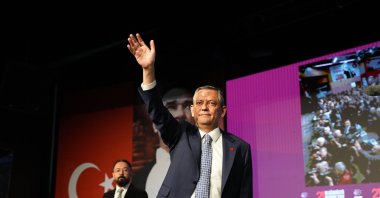 CHP leader Özgür Özel greets the audience at the convention, Ankara, Türkiye, April 6, 2025. (AA Photo)